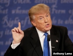 Republican presidential nominee Donald Trump speaks during the presidential debate Democratic presidential nominee Hillary Clinton at Hofstra University in Hempstead, New York, Sept. 26, 2016.