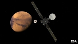 The ExoMars Trace Gas Orbiter and its entry, descent and landing demonstrator module, Schiaparelli, approaching Mars. The separation is scheduled to occur on 16 October 2016, about seven months after launch.