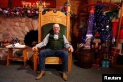 Thomas Valent, dean of the Charles W. Howard Santa Claus School, sits in the Santa House in Midland, Michigan, Oct. 29, 2016.