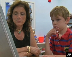 Carole Samango-Sprouse with Kevin Fitzgerald. Her goal, as a neurodevelopmentalist, is for all of her patients to reach their optimum potential and, ideally, be independent of their parents.