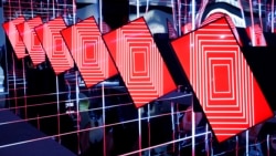 Samsung Sero TVs are on display at the Samsung booth during the CES tech show, Tuesday, Jan. 7, 2020, in Las Vegas. The TVs can rotate to play vertically or horizontally. (AP Photo/John Locher)