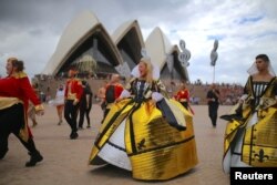 Members of the staff from the Sydney Opera House participate in a dress rehearsal in central Sydney, March 2, 2018, as part of preparations for their participation in the 40th anniversary of the Sydney Gay and Lesbian Mardi Gras Parade on Saturday.