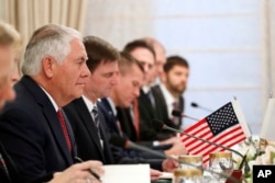 FILE - U.S. Secretary of State Rex Tillerson listens as Pakistani Prime Minister Shahid Khaqan Abbasi (not pictured) speaks during their meeting at the Prime Minister's residence, Oct. 24, 2017, in Islamabad, Pakistan.