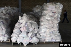 Sacks containing humanitarian aid are pictured at a warehouse near the Tienditas cross-border bridge between Colombia and Venezuela in Cucuta, Colombia, Feb. 14, 2019.