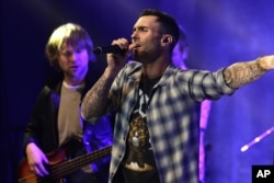 Adam Levine of the musical group Maroon 5 seen at Universal Music Group: Lucian Grainge’s 2015 Artist Showcase Presented by American Airlines and Citi at The Ace Hotel, Feb 7, 2015, in Los Angeles.