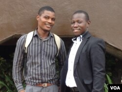 Mustapha Kallon stands with fellow survivor Brima Bockarie in Freetown, Sierra Leone, April 6, 2017. Kallon said that had he not reached out to others, he might not have been able to get through his depression. (N. DeVries/VOA)