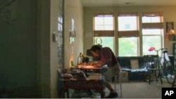 Artist Carl Tucker at work in an apartment specifically tailored for artists in Hyattsville, Maryland.