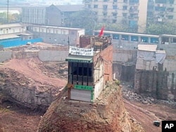 This “nail house” in Chongqing, China, is a dramatic example of how some property owners can stubbornly refuse to sell to developers - sometimes with dramatic consequences.
