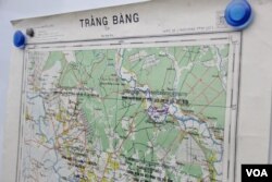 រូប​ភាពនៃ​ផែន​ទី​មួយ​ ក្នុង​ចំណោម​ផែន​ទី​ដែល​ទទួល​បាន​ពី​អង្គការ​សហប្រជាជាតិ​ (អ.ស.ប) ត្រូវ​បាន​ដាក់​បង្ហាញ​នៅ​លើ​ក្តារ នៅ​វិមាន​សន្តិភាព​ កាល​ពី​ថ្ងៃ​ទី​២០​ ខែ​សីហា​ ឆ្នាំ​២០១៥។ (ហ៊ាន​ សុជាតា/VOA)