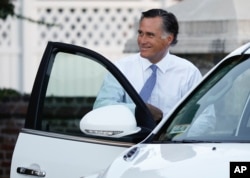 Mitt Romney gets into a vehicle as he leaves after meeting with President-elect Donald Trump at Trump National Golf Club in Bedminster, N.J., Nov. 19, 2016.