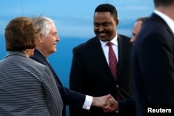 FILE - Former U.S. Secretary of State Rex Tillerson, second from left, and Ethiopia Foreign Minister Workneh Gebeyehu, second from right, meet in Ethiopia.