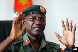 Major General John Enenche speaks during a press conference at the defense headquarters in Abuja, Nigeria, May 18, 2017.