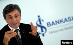 FILE - IS Bank Chairman Ersin Ozince, shown in March 31, 2011, is viewed as an outspoken critic of Turkish President Recep Tayyip Erdogan's economic policies.