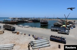 FILE - An eagle over flies at the Port of Bosaso in Somalia's Puntland, Apr. 19, 2015.