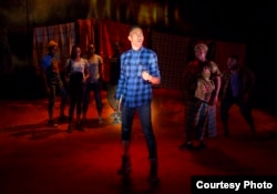 Griffin Matthews and the company of "Invisible Thread" at the Second Stage Theatre in New York. (Credit: Joan Marcus)