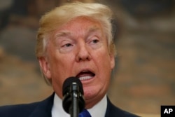FILE - President Donald Trump speaks in the Roosevelt Room of the White House in Washington during the unveiling of legislation that would place new limits on legal immigration, Aug. 2, 2017. After months of delays, Trump is expected to decide soon on the fate of so-called “dreamers” who were brought into the country illegally as children.