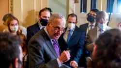 FILE - Senate Majority Leader Chuck Schumer, D-N.Y., speaks to reporters as work continues on the Democrats' Build Back Better Act, massive legislation that is a cornerstone of President Joe Biden's domestic agenda, at the Capitol, in Washington, Sept. 14