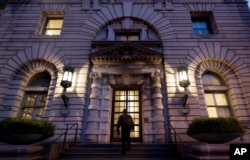 A man walks up the steps of the 9th U.S. Circuit Court of Appeals building, Feb. 9, 2017, in San Francisco.