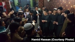 Hamid Hassan is surrounded by fans in Kandahar city, a stronghold of Taliban militants.