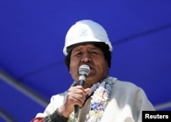FILE - Bolivia's President Evo Morales speaks on the salt lake of Uyuni, Potosi, Bolivia, Oct. 7, 2018.