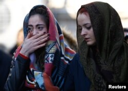 Relatives attend the funeral of Busra Kose, a victim of an attack by a gunman at Reina nightclub, in Istanbul, Turkey, Jan. 2, 2017.