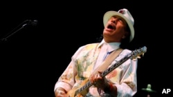Musician Carlos Santana performs during his concert in Bangalore, India, Oct. 26, 2012.