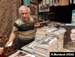 Bookseller Naja Abood, seen in Baghdad, May 6, 2018, says he fears any new leaders will be trapped in a long-corrupted system that has little hope to bring positive change.
