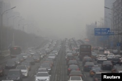 REUTERS Traffic in polluted weather of Beijing, China