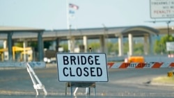 The international bridge where thousands of Haitian migrants have created a makeshift camp remains closed, Sept. 18, 2021, in Del Rio, Texas. The Biden administration plans an expulsion of Haitian migrants from the small Texas border city.
