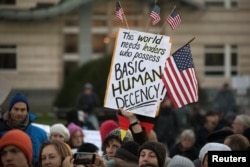 People protest against U.S. President-elect Donald Trump in Berlin, Germany, Nov. 12, 2016.