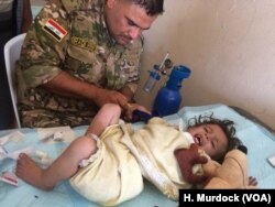 Doctors say children and the elderly are most injured by lack of good food and water in the chaos of the war in Iraq, but they are also most likely to be injured in the violence. As families flee, IS militants fire at them and people that run the slowest are the most likely to be hit in Mosul, Iraq, June 21, 2017.