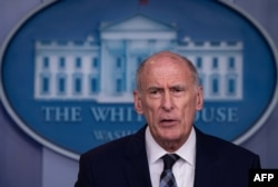 FILE - U.S. Director of National Intelligence Dan Coats speaks during a press briefing at the White House, Aug. 2, 2018.