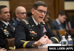FILE - U.S. Army General Joseph Votel, commander of the U.S. Central Command, testifies during a House Armed Services Committee hearing on Capitol Hill in Washington, Feb. 27, 2018.