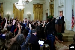 President Donald Trump speaks during a news conference in the East Room at the White House in Washington, Nov. 7, 2018.