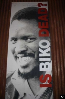A large poster of anti-apartheid activist, Steve Biko, on one of the museum's memory boxes', which are made out of the same rusted metal as locals use to construct their shacks