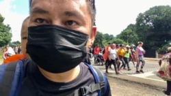 来自浙江的卢先生背着四岁的儿子，从南美洲步行北上，穿越墨西哥到美国 (照片本人提供）