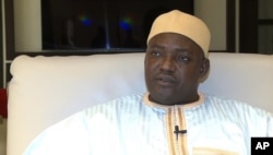 In this image taken from video, Gambia's new president Adama Barrow talks during an interview with The Associated Press in Dakar, Senegal, Jan. 21, 2017, just hours after Yahya Jammeh agreed to step down from office.