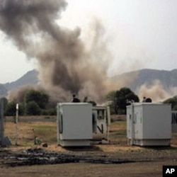 A huge explosion is seen near a United Nations compound in South Kordofan state, June 14, 2011