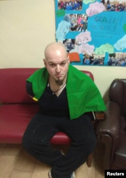 Luca Traini, 28, suspected by police of opening fire on African migrants, is seen in Macerata, Italy, Feb. 3, 2018.