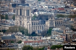 A view shows Notre-Dame Cathedral after a massive fire devastated large parts of the gothic structure in Paris, France, April 16, 2019.