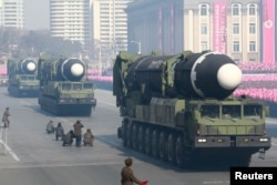 FILE - Intercontinental ballistic missiles are seen at a grand military parade celebrating the 70th founding anniversary of the Korean People's Army at the Kim Il Sung Square in Pyongyang, in this photo released by North Korea's Korean Central News Agency (KCNA) Feb. 9, 2018.