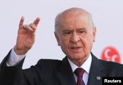 Devlet Bahceli, leader of Nationalist Movement Party (MHP), gestures as he attends his election rally in Ankara, Turkey, June 23, 2018.