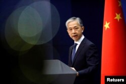Juru bicara Kementerian Luar Negeri China Wang Wenbin berbicara selama konferensi pers di Beijing, China, 14 Desember 2020. (Foto: Reuters)