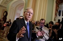 FILE - Senate Majority Leader Mitch McConnell of Kentucky speaks to reporters on Capitol Hill, April 4, 2017.
