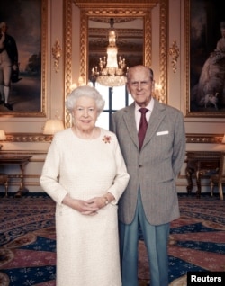Britain's Queen Elizabeth II and Prince Philip, Duke of Edinburgh, at Windsor Castle in early November. They celebrate their platinum wedding anniversary, Nov. 20, 2017. (Matt Holyoak/CameraPress/PA Wire/Handout via REUTERS)