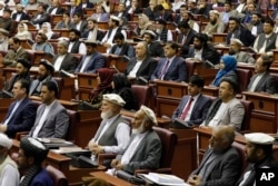 Afghan lawmakers are seen during the inauguration of the country's new parliament in Kabul, Afghanistan, April 26, 2019.