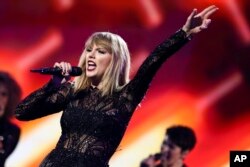 FILE - Taylor Swift performs at DIRECTV NOW Super Saturday Night Concert at Club Nomadic, Feb. 4, 2017 in Houston, Texas.