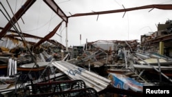 A supermarket was damaged after the area was hit by Hurricane Maria, Guayama, Puerto Rico Sept. 20, 2017.