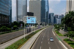 Suasana jalanan di Jakarta tampak sepi pada saat penerapan PPKM Darurat yang diberlakukan 3-20 Juli 2021 (foto: Reuters).