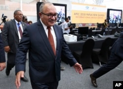Papua New Guinea Prime Minister Peter O'Neill inspects the APEC 2018 International Media Center at Port Moresby, Papua New Guinea, Nov. 14, 2018.